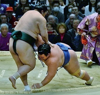 Rehabilitated sumo wrestler repays stablemaster with 1st