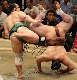 Rehabilitated sumo wrestler repays stablemaster with 1st